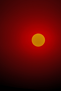 sun rising over Boise foothills in smoke from wildfires